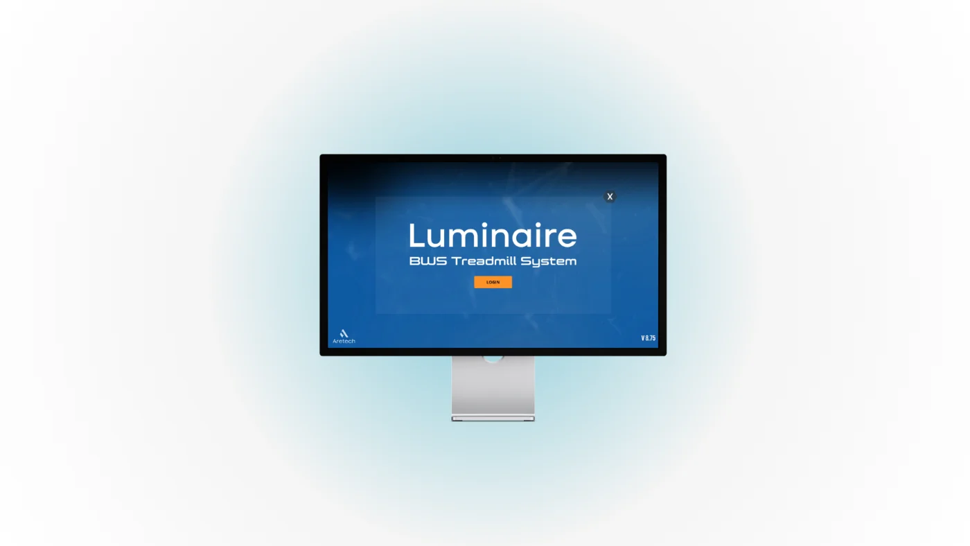 Luminaire BWS Treadmill System login screen on the 24-inch touchscreen
