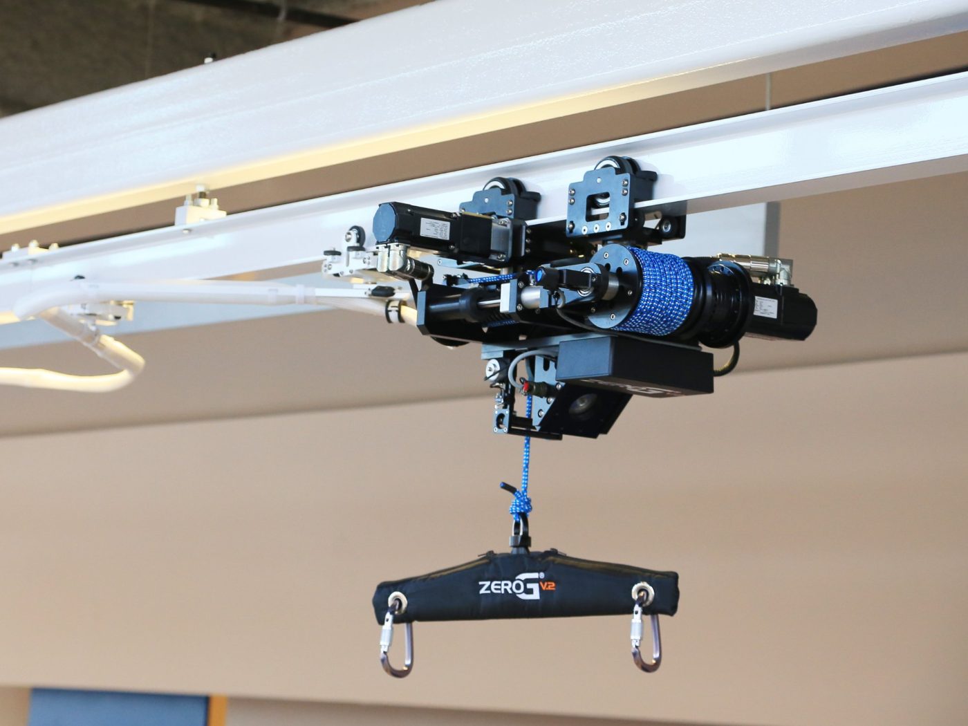 The ZeroG Version 2 trolley and harness running on its overhead track
